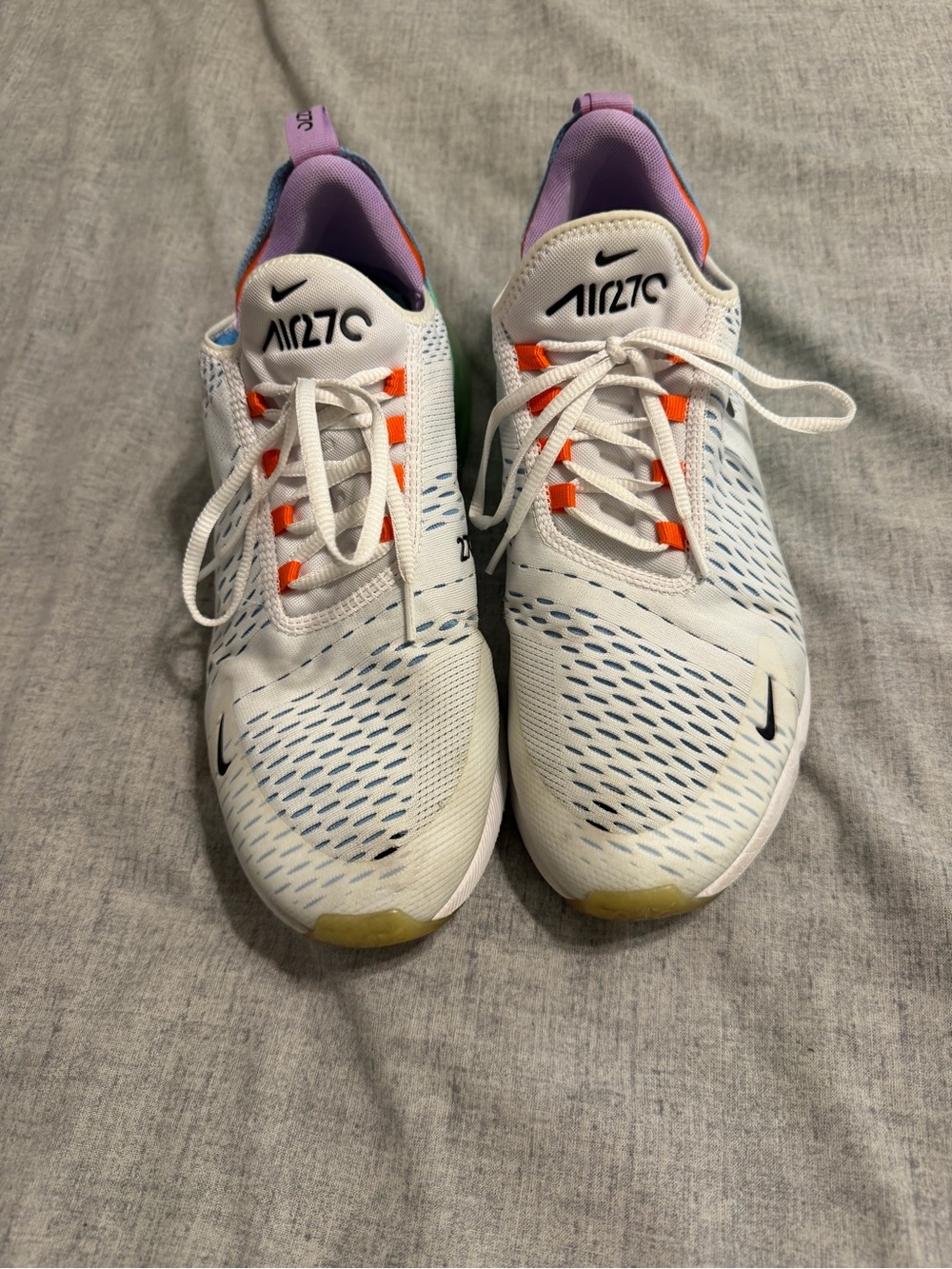 Nike White Running Sneakers with Orange Accents and Purple Lining